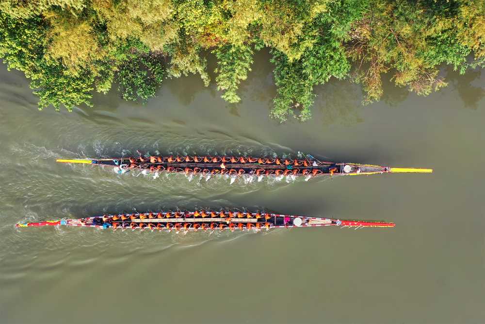 Colorful boat race from above