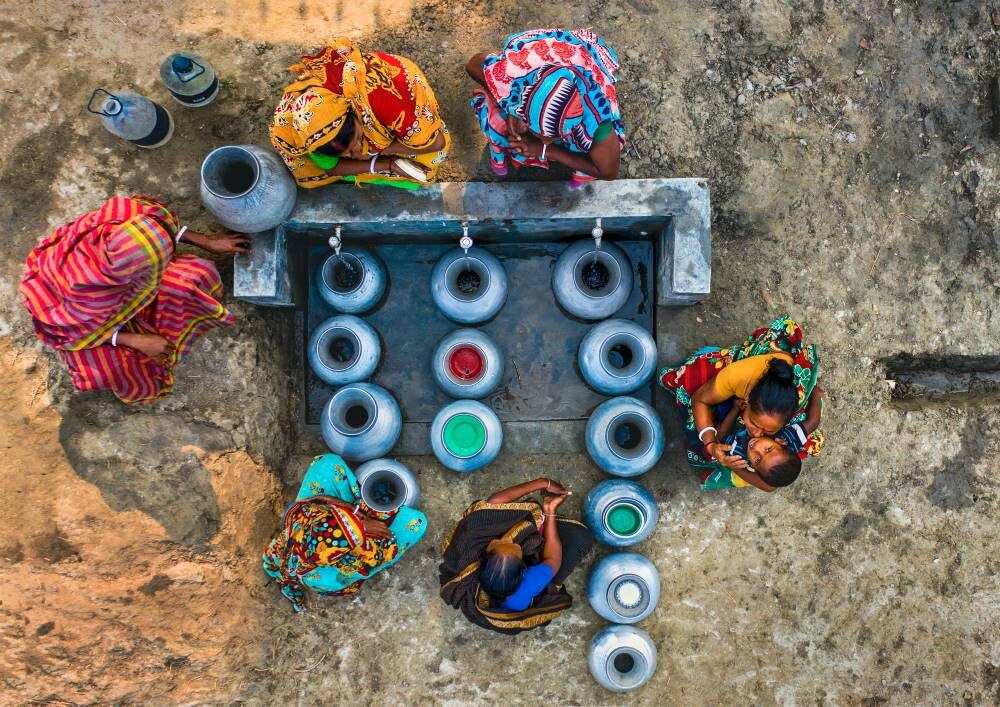 Boats crossing the water in Bangladesh, seen from above
