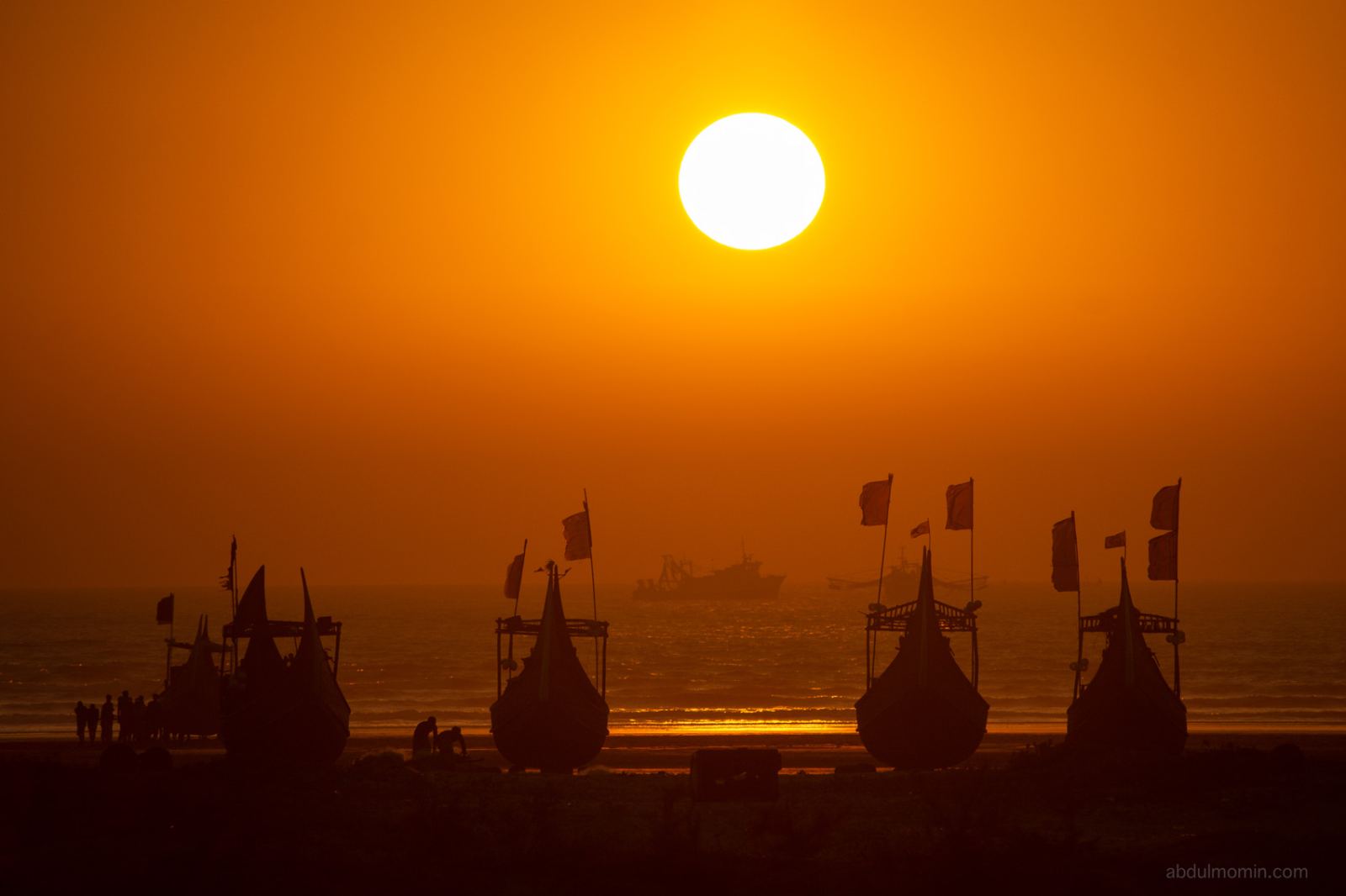 Moon Boats on the Coastal Surf